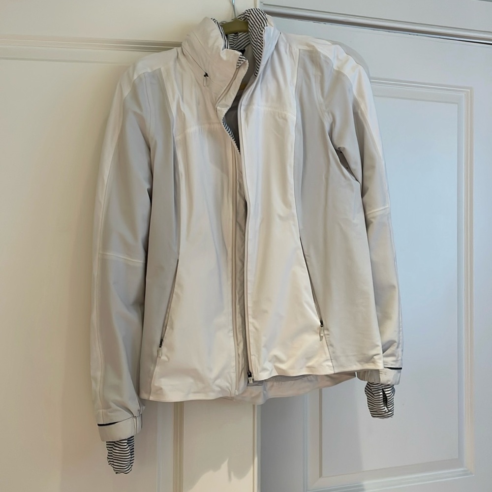 Lululemon beige running jacket, size 6, excellent condition.